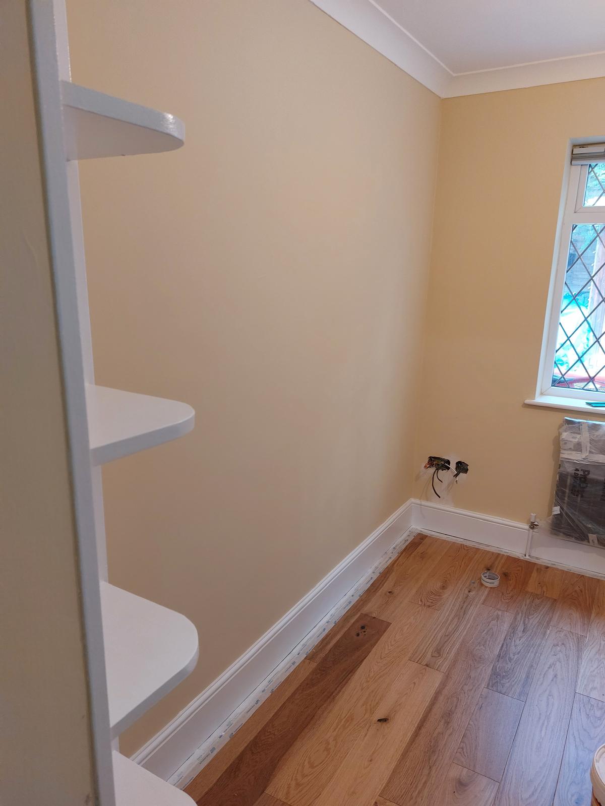 Decorated room with shelving and finish carpentry